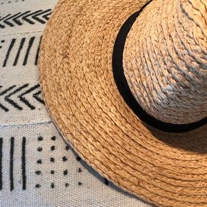 Large brim straw Fedora hat with black ribbon